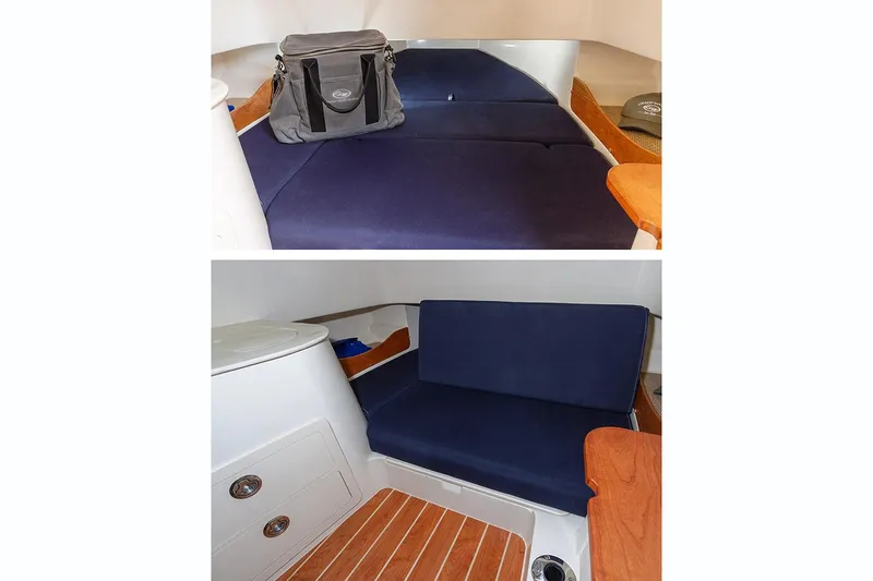 Slide: The Image of Manufacturer Provided Image: 2020 Grady-White Canyon 336 cabin interior with blue seating and wooden accents. - 11