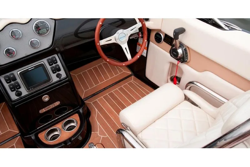 Slide: The Image of Manufacturer Provided Image: 2016 Chris-Craft Capri 21 boat interior with luxurious seating and advanced dashboard controls. - 6