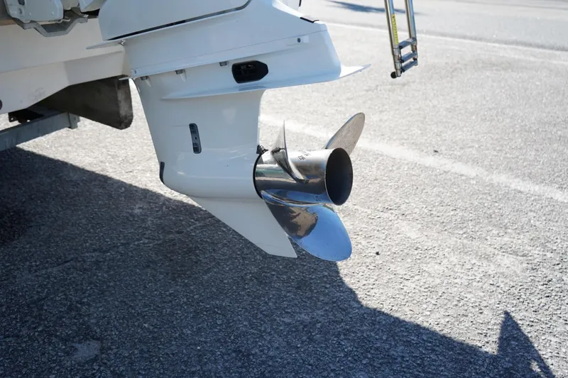 Slide: The Image of 2023 Robalo 246 Cayman boat propeller and outboard motor detail. - 10