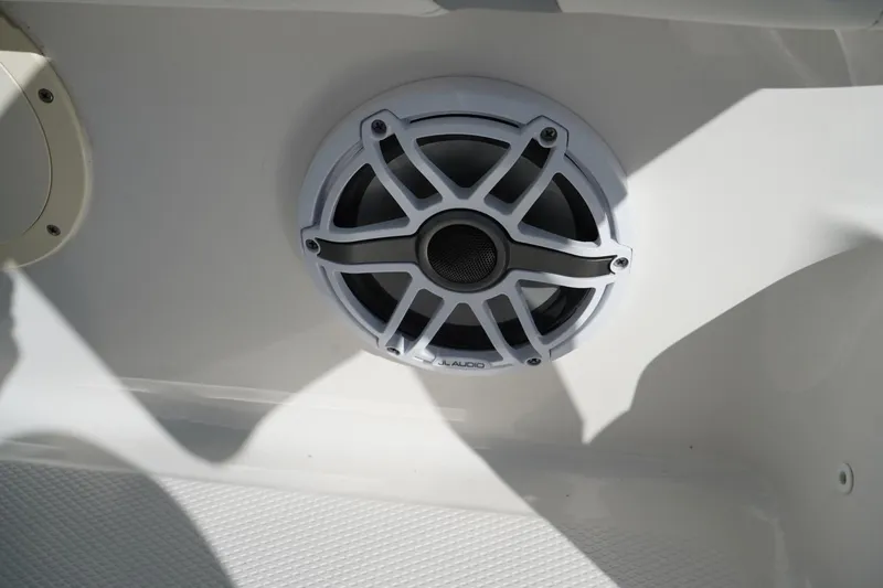 Slide: The Image of 2023 Robalo 246 Cayman boat speaker detail, showcasing marine audio system. - 11