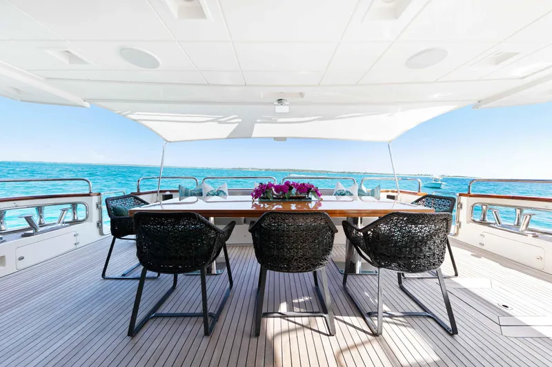 Slide: The Image of Luxurious Azimut Grande 32M yacht aft deck with elegant dining area, ocean view, 2012 model. - 16