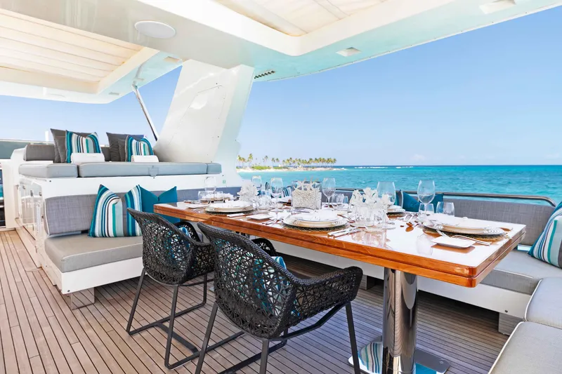 Slide: The Image of Luxurious aft deck dining area on 2012 Azimut Grande 32M yacht with ocean view. - 17