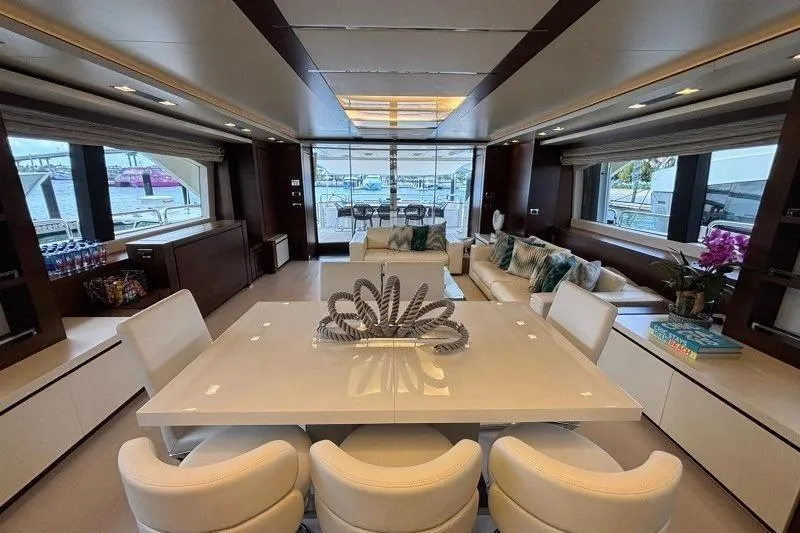 Slide: The Image of Luxurious main salon dining area on 2012 Azimut Grande 32M yacht with ocean view. - 24
