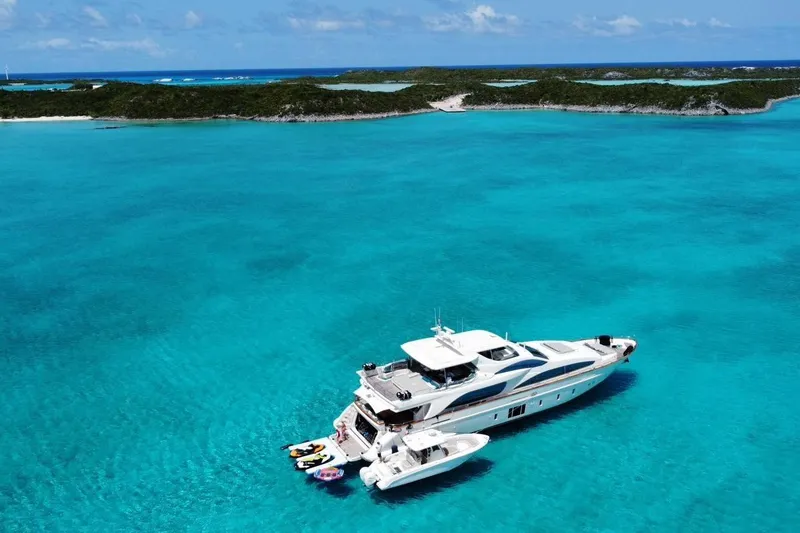 Slide: The Image of Luxury Azimut Grande 32M yacht anchored in turquoise waters, 2012 model. - 3