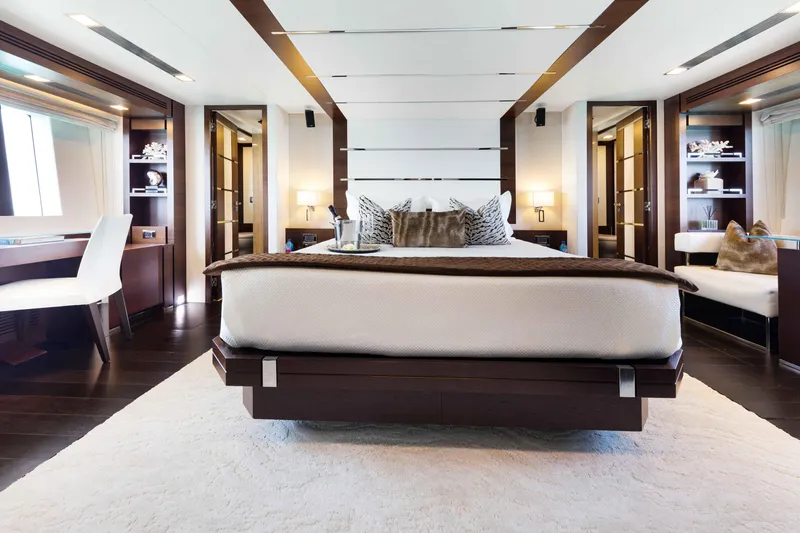 Slide: The Image of Luxurious Master bedroom interior on Azimut Grande 32M yacht, featuring elegant furnishings and modern design. - 30