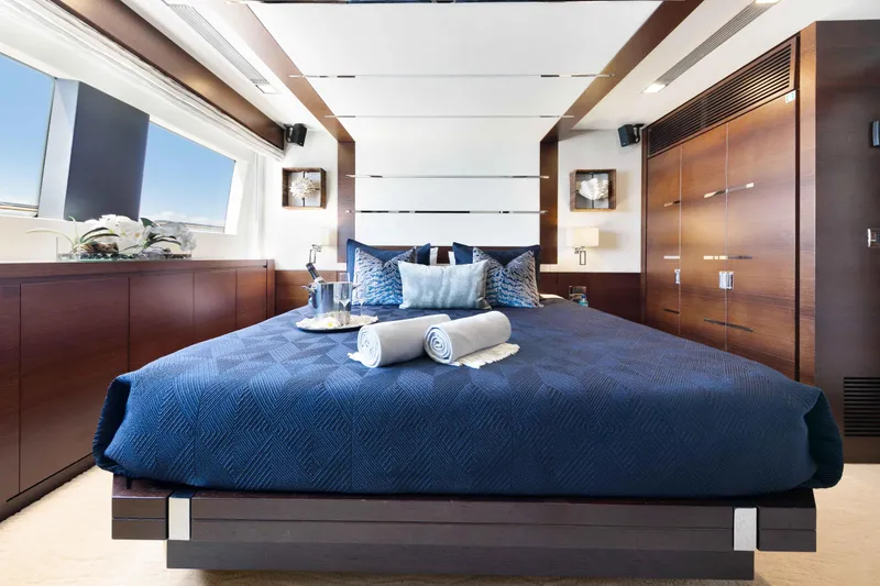 Slide: The Image of Luxurious Main Deck VIP bedroom interior on 2012 Azimut Grande 32M yacht with elegant decor. - 50