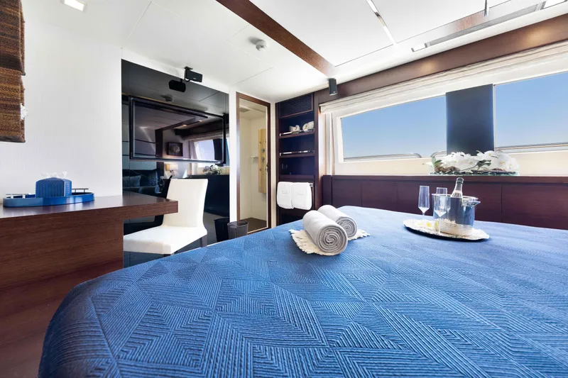 Slide: The Image of Luxurious Main Deck VIP bedroom interior on 2012 Azimut Grande 32M yacht with elegant decor. - 51