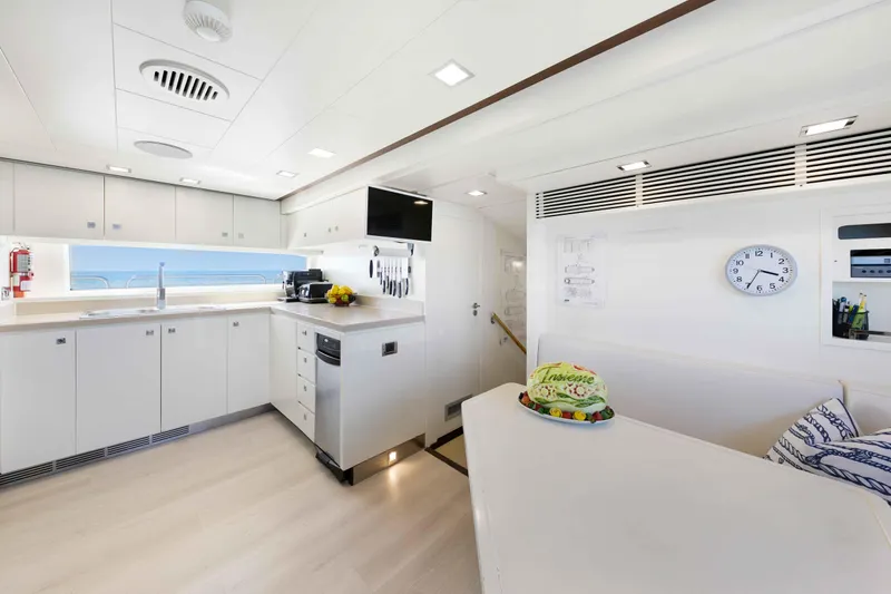 Slide: The Image of Luxurious kitchen interior of 2012 Azimut Grande 32M yacht with modern amenities. - 57