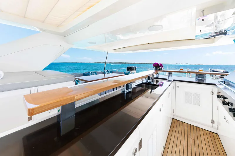 Slide: The Image of Luxurious Azimut Grande 32M yacht deck with sleek bar and ocean view, 2012 model. - 65