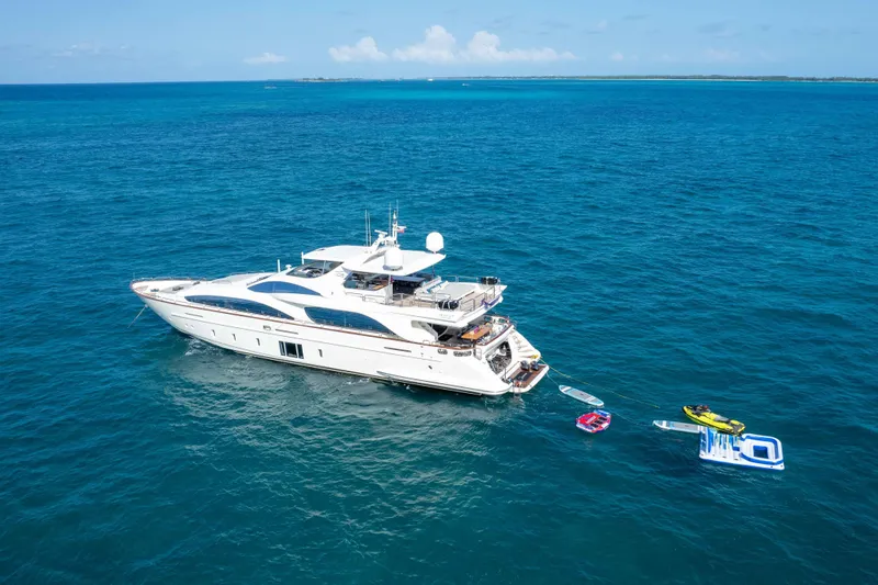 Slide: The Image of Azimut Grande 32M yacht, 2012 model, anchored in clear blue ocean with water toys. - 7