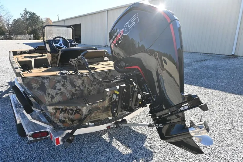 Slide: The Image of 2026 Thor 1900 Lake Hammer Center Console Elite boat with powerful outboard motor. - 6