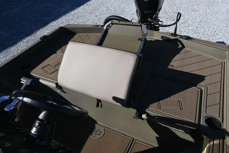 Slide: The Image of 2026 Thor 1900 Lake Hammer Center Console Elite boat interior with steering wheel and seating. - 8