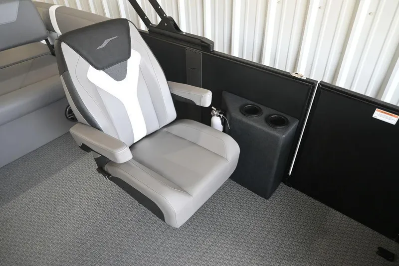 Slide: The Image of Gray and black seat in 2026 Evotti 523CS boat interior with cup holders. - 10