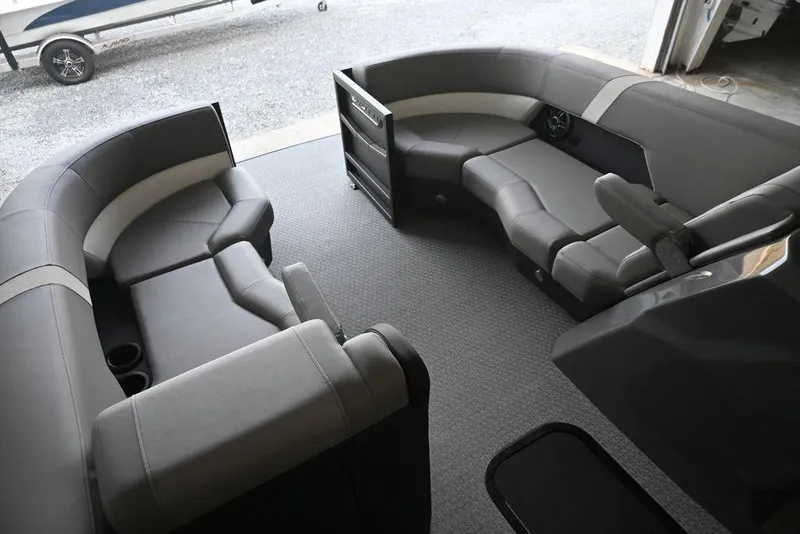 Slide: The Image of 2026 Evotti 523CS boat interior with luxurious gray seating and modern design. - 13