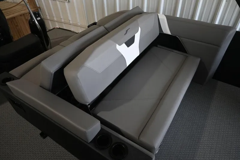 Slide: The Image of Luxurious seating in the 2026 Evotti 523CS boat, featuring sleek gray upholstery. - 21