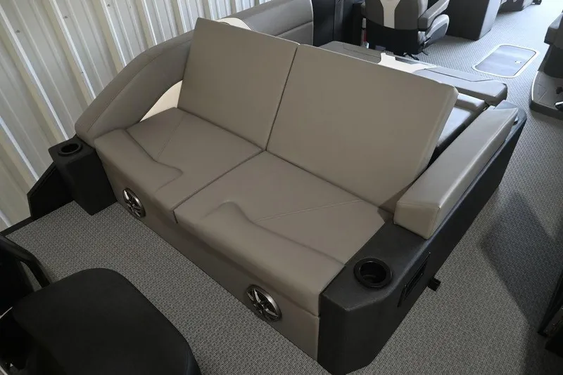 Slide: The Image of 2026 Evotti 523CS interior with gray seating, cup holders, and modern design. - 23