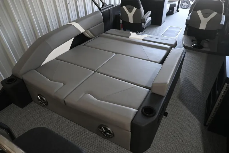 Slide: The Image of Interior of 2026 Evotti 523CS boat with convertible seating and modern design. - 25