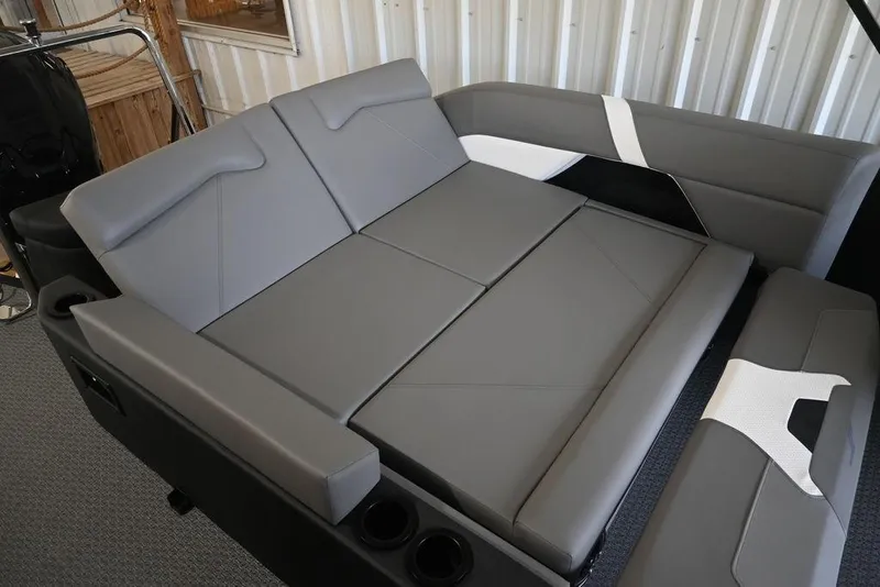Slide: The Image of 2026 Evotti 523CS boat interior with sleek gray seating and modern design. - 26