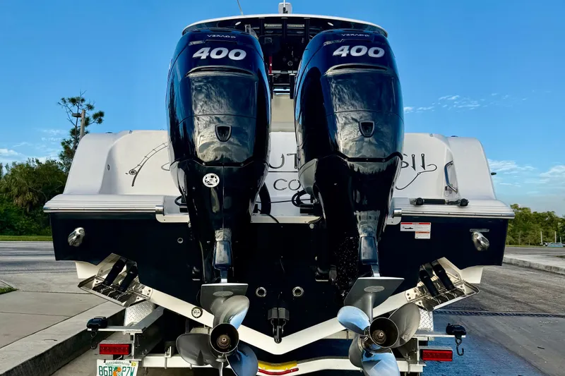 Slide: The Image of 2022 Sportsman Open 322 Center Console with twin 400 horsepower engines. - 25