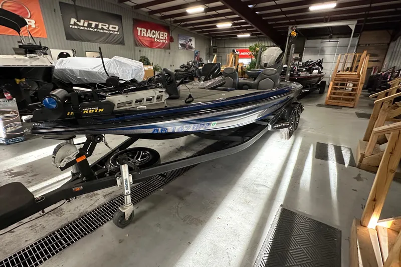 Slide: The Image of 2016 Skeeter FX20 Limited Edition boat in showroom, featuring sleek design and advanced equipment. - 6