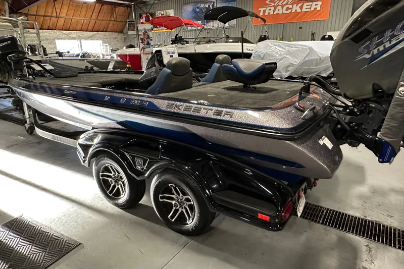 Slide: The Image of 2016 Skeeter FX20 Limited Edition bass boat in showroom, on trailer. - 7