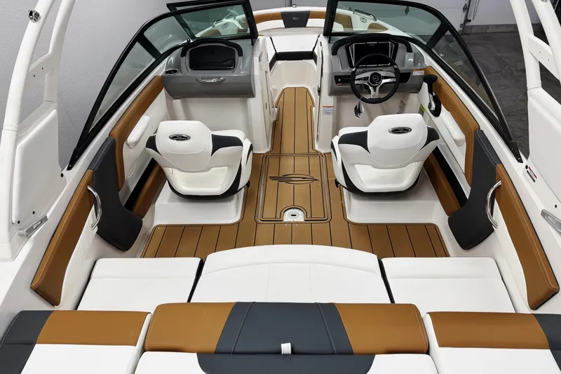 Slide: The Image of 2026 Chaparral 21 SSi boat interior with modern seating and sleek design. - 7
