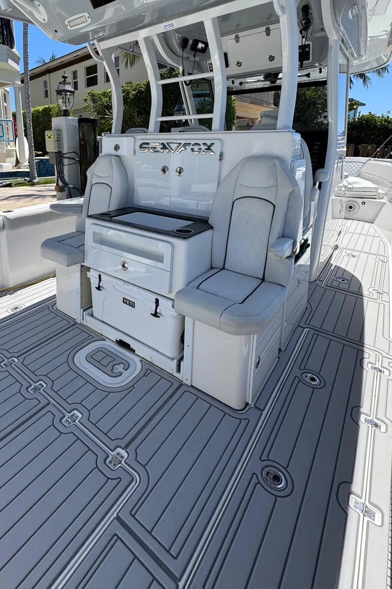 Slide: The Image of 2020 Sea Fox 368 Commander boat interior with seating and storage. - 13