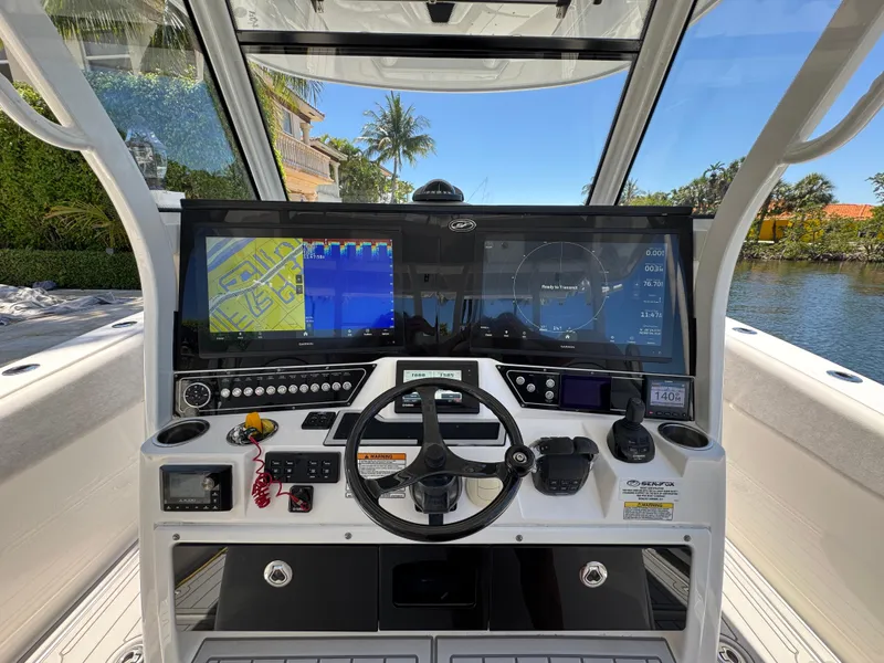 Slide: The Image of 2020 Sea Fox 368 Commander helm with advanced navigation displays and controls. - 18
