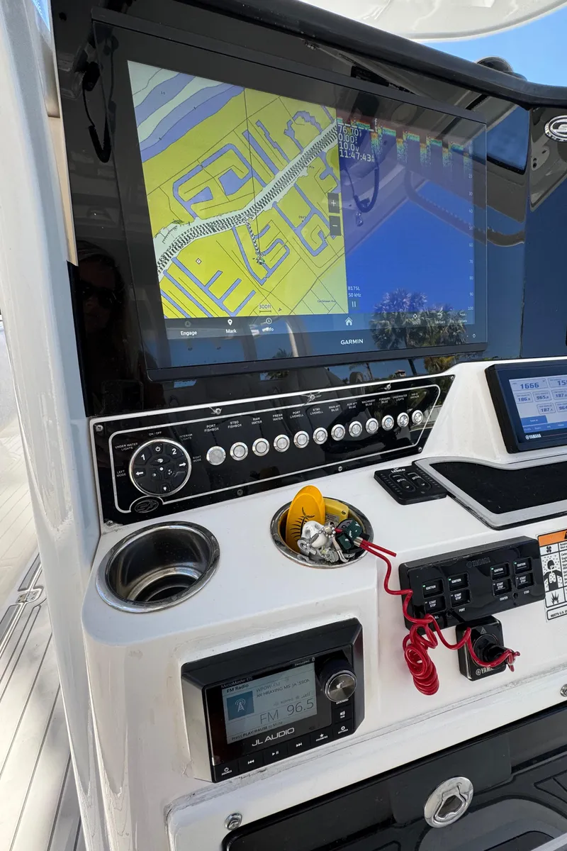 Slide: The Image of Control panel of 2020 Sea Fox 368 Commander with navigation display and controls. - 19