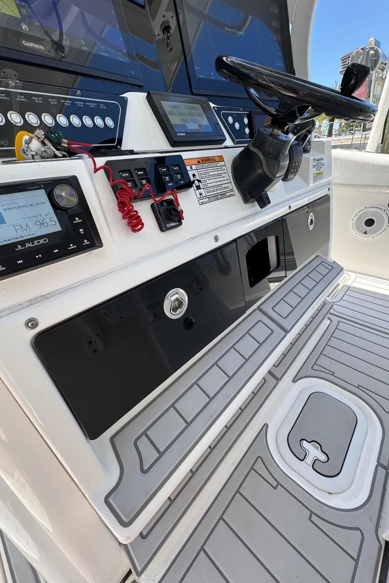 Slide: The Image of 2020 Sea Fox 368 Commander boat dashboard with advanced controls and navigation systems. - 20