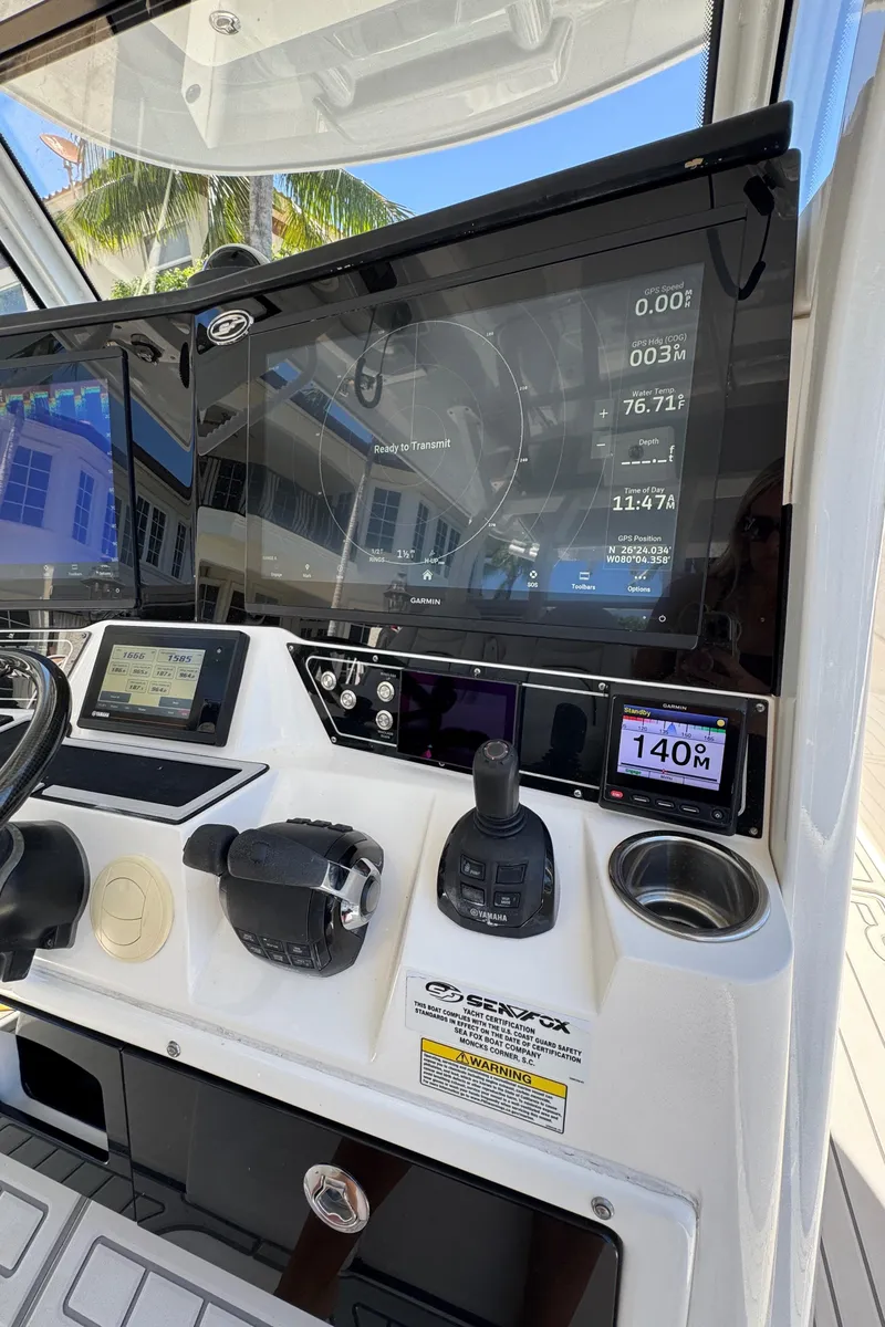 Slide: The Image of 2020 Sea Fox 368 Commander helm with advanced navigation displays and controls. - 22