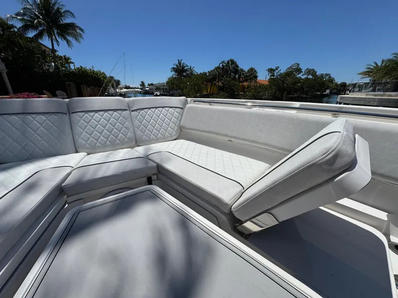 Slide: The Image of 2020 Sea Fox 368 Commander boat with luxurious white seating and quilted upholstery. - 33