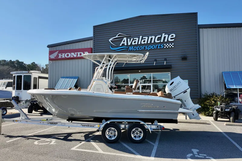 The Image of 2026 Pioneer 202 Islander boat on trailer at Avalanche Motorsports dealership. - 1