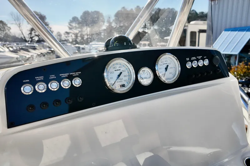 Slide: The Image of Dashboard of 2026 Pioneer 202 Islander boat with gauges and controls. - 6