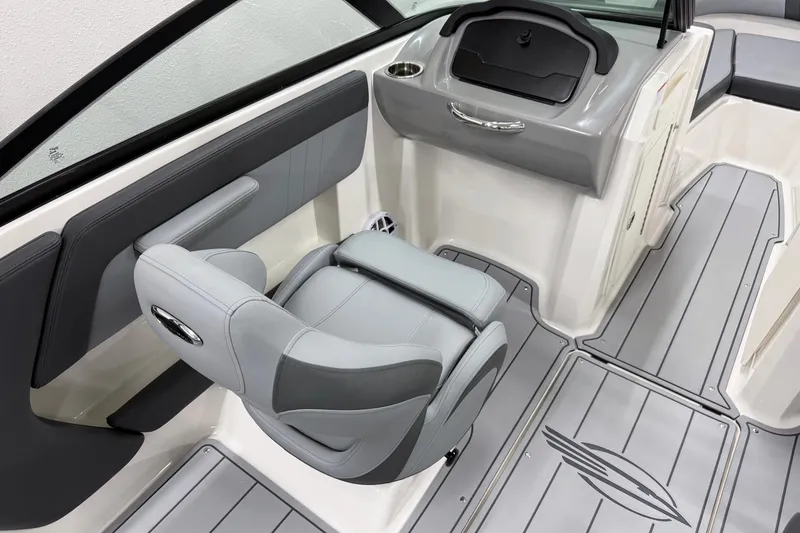 Slide: The Image of 2026 Chaparral 21 SSi OB boat interior with gray seating and sleek design. - 20