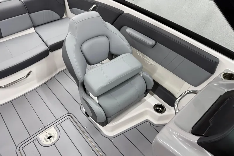 Slide: The Image of 2026 Chaparral 21 SSi OB boat interior with gray seating and modern design. - 22