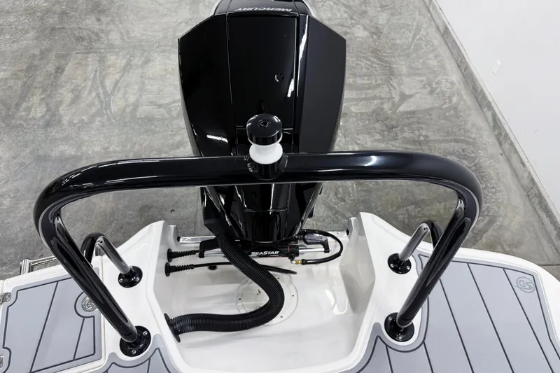 Slide: The Image of 2026 Chaparral 21 SSi OB boat engine and deck view. - 23