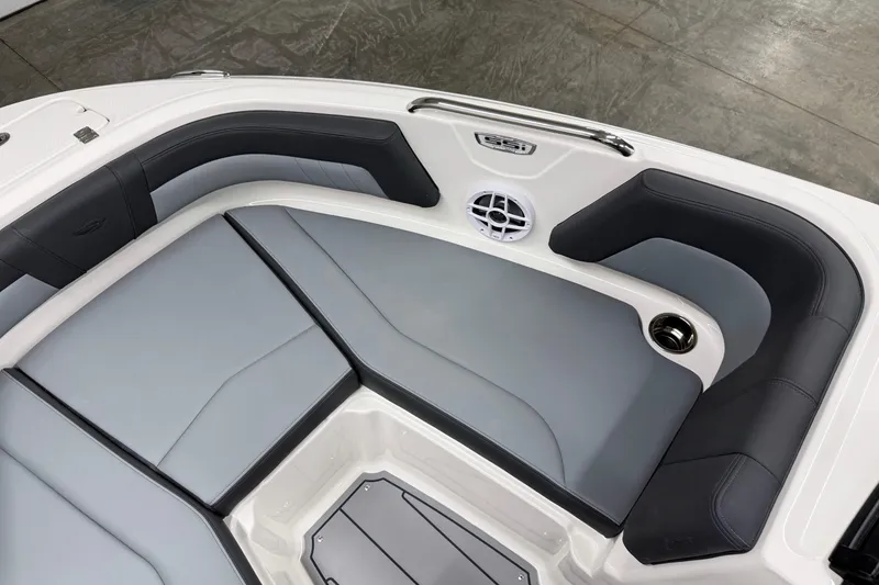 Slide: The Image of 2026 Chaparral 21 SSi OB boat interior with sleek gray and black seating. - 30
