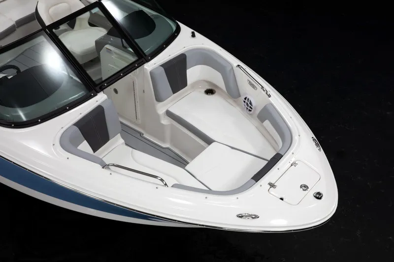 Slide: The Image of 2026 Chaparral 21 SSi OB boat interior with seating and storage compartments. - 4