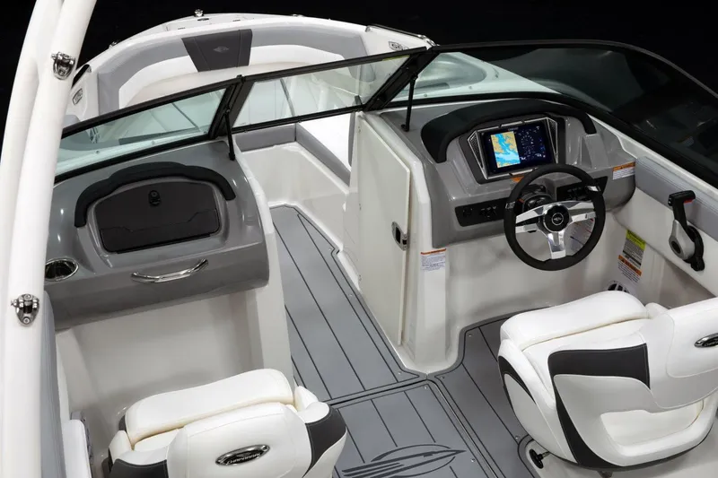 Slide: The Image of 2026 Chaparral 21 SSi OB boat interior with gray seating and Mercury engine. - 5