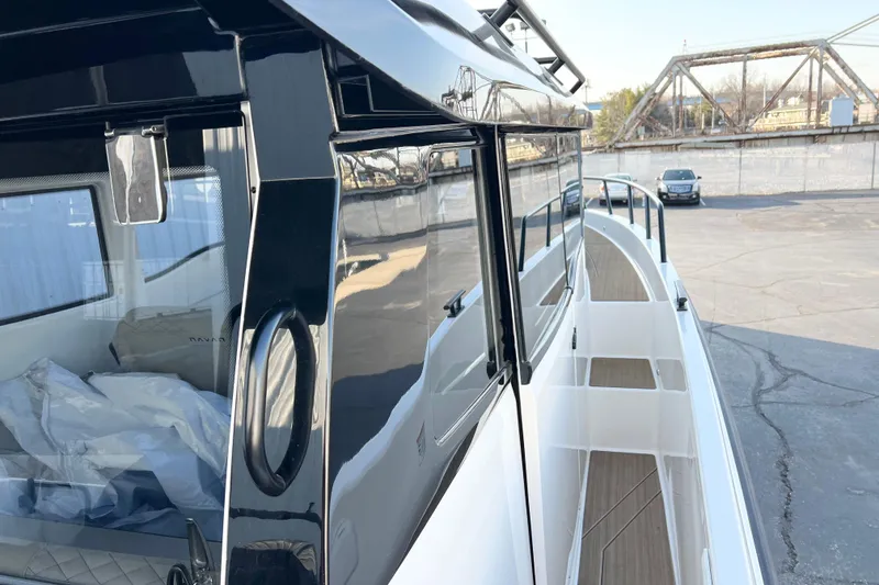 Slide: The Image of 2026 Navan C30 boat exterior with sleek design and modern features. - 10