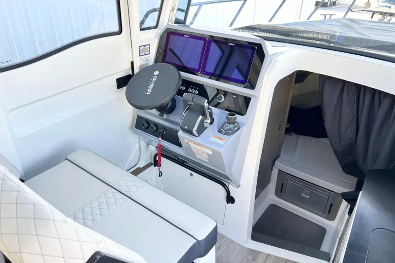 Slide: The Image of Interior of 2026 Navan C30 boat with modern helm and seating. - 15