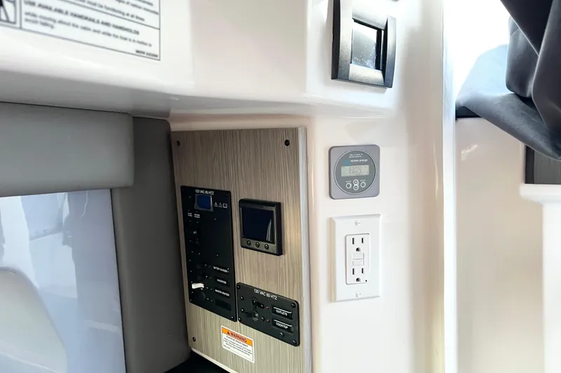 Slide: The Image of Control panel and outlets in 2026 Navan C30 vehicle interior. - 19