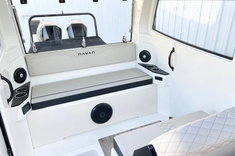 Slide: The Image of Interior of 2026 Navan C30 boat with seating and cup holders. - 20