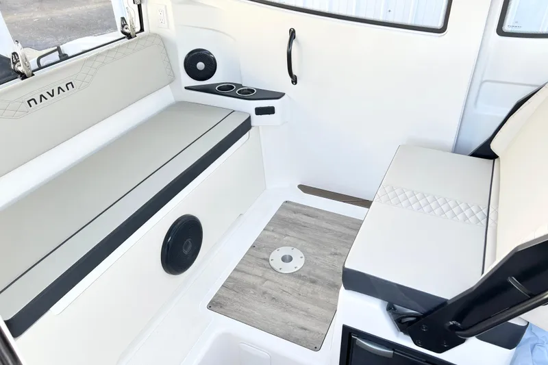 Slide: The Image of Interior of 2026 Navan C30 boat with seating and cup holders. - 21