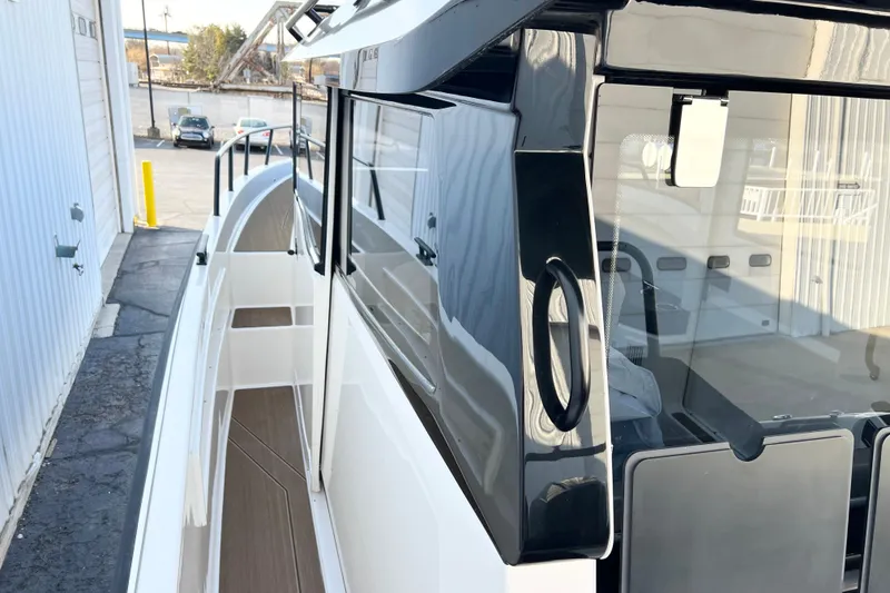 Slide: The Image of 2026 Navan C30 boat exterior with sleek design and modern features. - 7