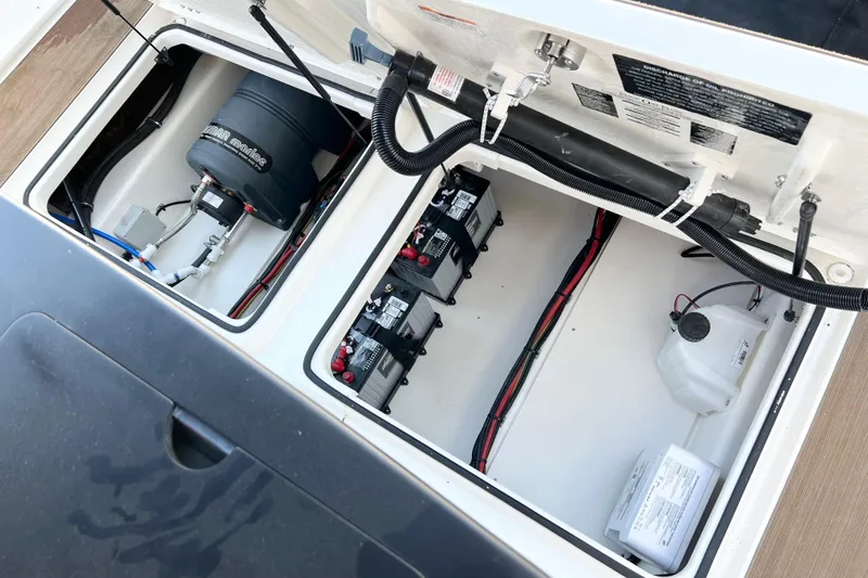 Slide: The Image of 2026 Navan C30 boat engine compartment with batteries and wiring. - 8