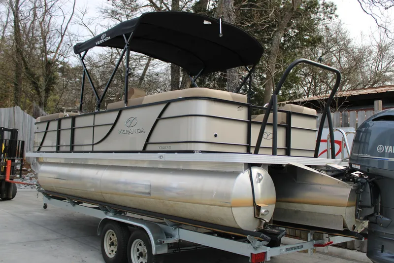 Slide: The Image of 2023 Veranda VR22RC pontoon boat on trailer with Yamaha outboard motor. - 3