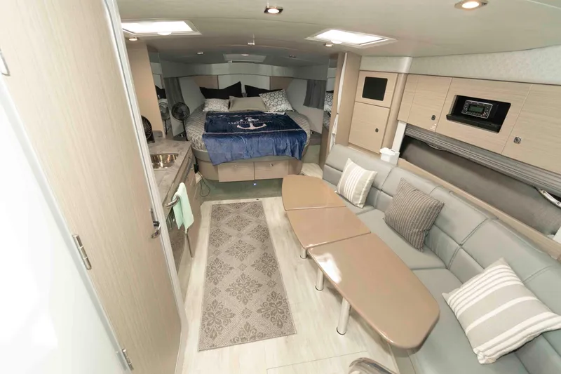 Slide: The Image of Interior of 2019 Formula 34 Performance Cruiser with modern seating and cozy sleeping area. - 17