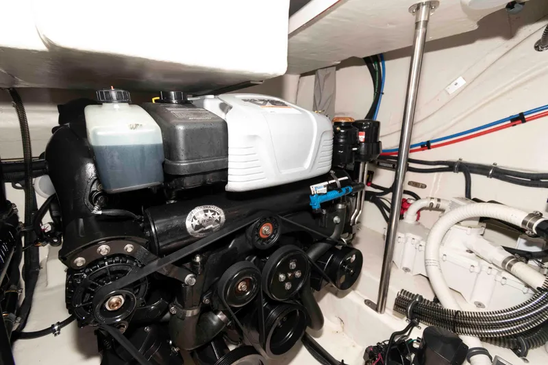 Slide: The Image of Engine compartment of a 2019 Formula 34 Performance Cruiser, showcasing mechanical components. - 26